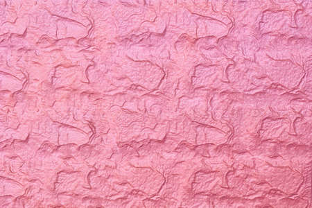Delicate pink red rough structured background for decor, text and advertisingの写真素材