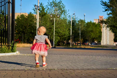 Charm girl child traveler exploring the surroundings discovering the worldの写真素材