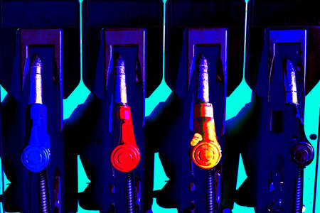 Blue neon pistols for refueling cars with diesel or gasolineの写真素材