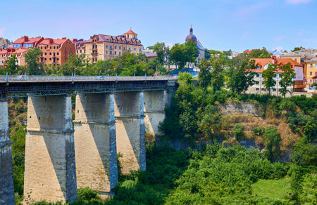 High bridge over a canyon in a summer medieval town