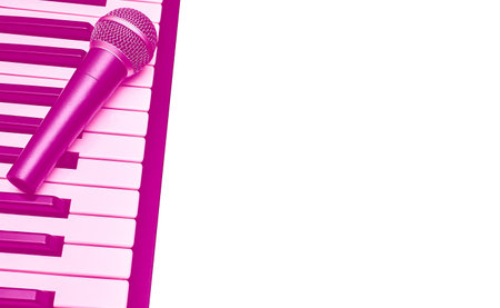 Vocal microphone for singing karaoke on piano synth keys in pink magenta,isolateの写真素材