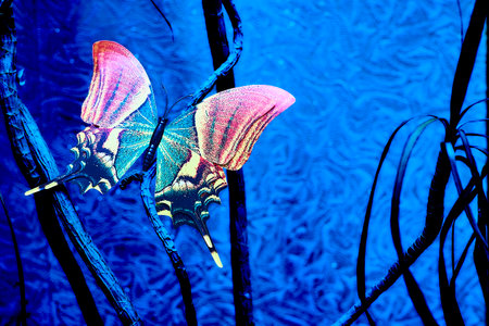Pink azure butterfly on a night blue mystical plant background
