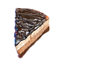 Piece of chocolate cream brown yummy cake isolated on whiteの写真素材