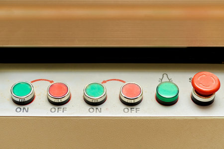 Red and green buttons switch for turn on turn off machine tool, equipment