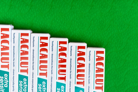 Kyiv, Ukraine. May 01.2023. Toothpaste Lacalut desensitizing teeth on a greenのeditorial素材