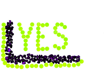 Inscription Yes. Frame by shining glittering purple green stones on whiteの写真素材