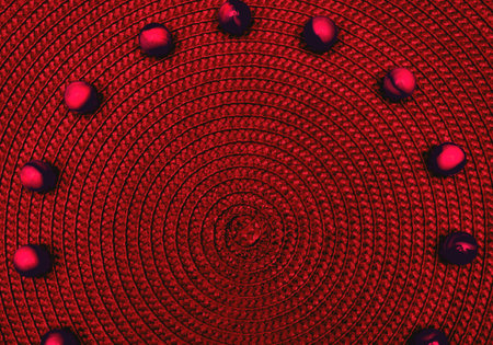 Dark red spiral round straw background with balls. Place for text