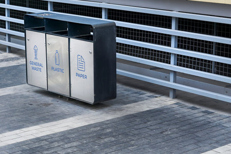 trash, such as paper, cans, and bottles, that is left lying in an open or public placeの写真素材