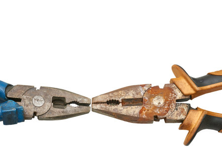 pincers with parallel, flat, and typically serrated surfaces, used chiefly for gripping small objects or bending wireの写真素材