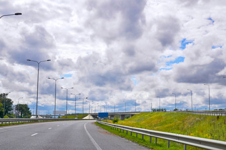 a wide way leading from one place to another, especially one with a specially prepared surface which...