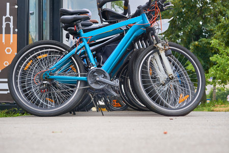 a vehicle composed of two wheels held in a frame one behind the otherの写真素材
