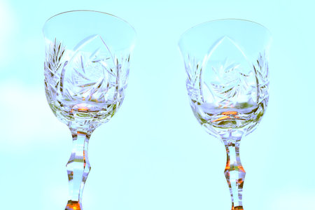 a glass with a stem and foot, used for drinking wine