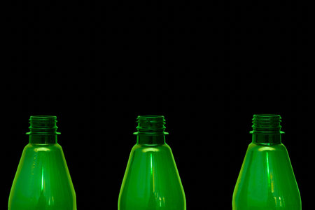 a container, typically made of glass or plastic and with a narrow neck, used for storing drinks or other liquidsの写真素材