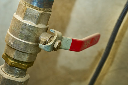 a device for controlling the passage of fluid or air through a pipe, duct, etcの写真素材