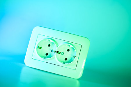 able to be connected by means of a plug. an electrical device receiving a plug or light bulb to make a connectionの写真素材