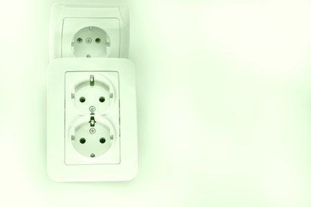 able to be connected by means of a plug. an electrical device receiving a plug or light bulb to make a connectionの写真素材