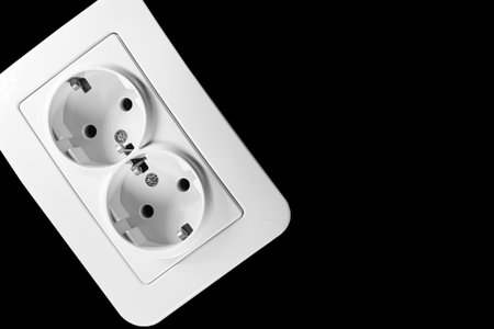 able to be connected by means of a plug. an electrical device receiving a plug or light bulb to make a connectionの写真素材