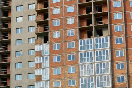 The action of installing windows. A building for human habitation, housing