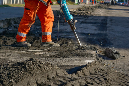 A powerful, hand held tool operated by compressed air or electricity, used to break up or demolish...