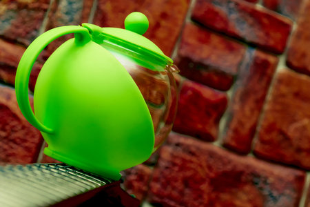 a hot drink made by infusing the dried crushed leaves of the tea plant in boiling waterの写真素材