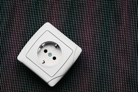 able to be connected by means of a plug. an electrical device receiving a plug or light bulb to make...