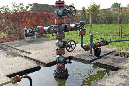 Leaking oil from pipes and ventil. Ground pollutionの写真素材