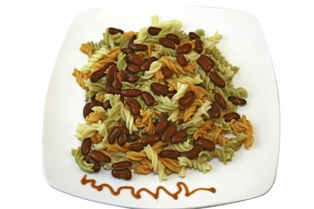 Mediterranean pasta with red beans at the plateの写真素材