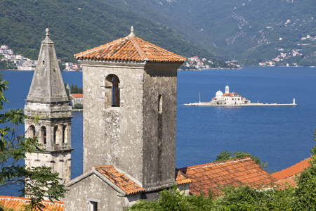 Montenegro - old medieval Mediterranean town - church, cathedral and islandの写真素材