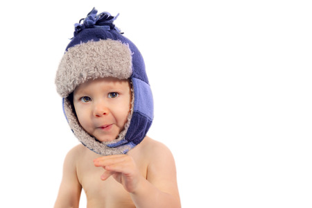 adorable baby wearing a winter capの写真素材