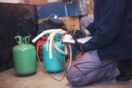 Air conditioning master entering malfunction in a workshopの写真素材