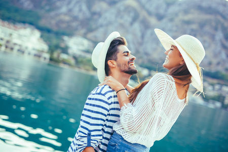 Couple in love, enjoying the summer time by the sea.の写真素材