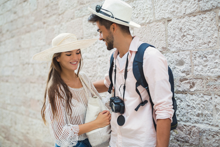 Tourist couple enjoying sightseeing and exploring cityの写真素材