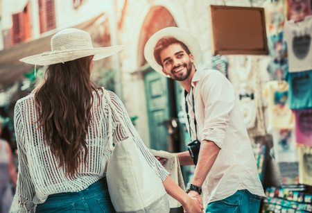 Tourist couple enjoying sightseeing and exploring cityの写真素材