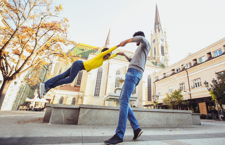 Happy father spending time with their daughter, having funの写真素材