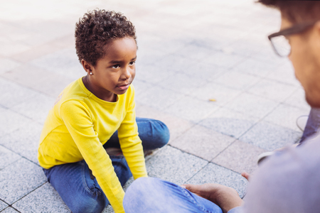 Happy father spending time with their daughter, having funの写真素材