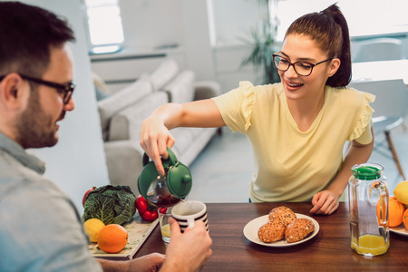 Couple having breakfast in the morningの写真素材