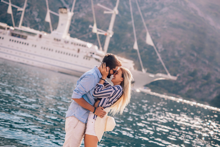 Couple in love, enjoying the summer time by the sea.の写真素材