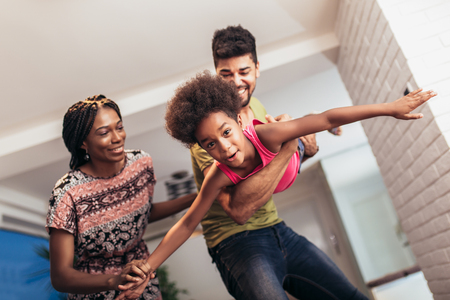 African american family spending time together at home. They are having funの写真素材