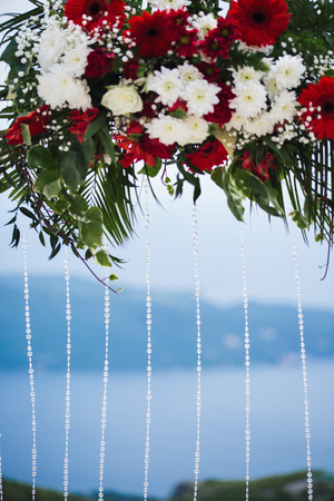 Forged wedding arch. Wedding on the seaの写真素材