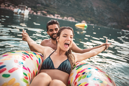 Happy couple resting at sea resort