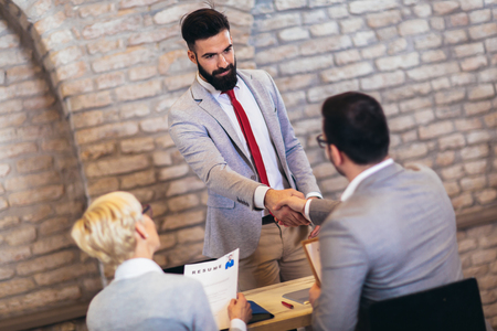Job applicants having interview in modern officeの写真素材