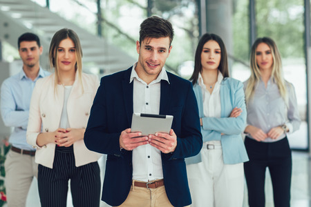 Group of happy business people and company staff in modern office, representig companyの写真素材