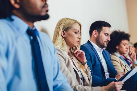 Photo of candidates waiting for a job interview. Selective focusの写真素材