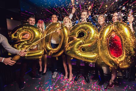 New year party celebration with friends in the clubの写真素材