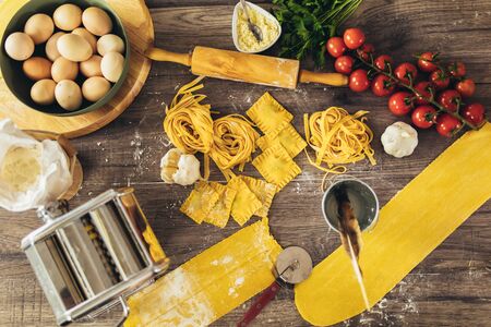 Different types of homemade pasta. Fresh pasta homemade preparationの写真素材