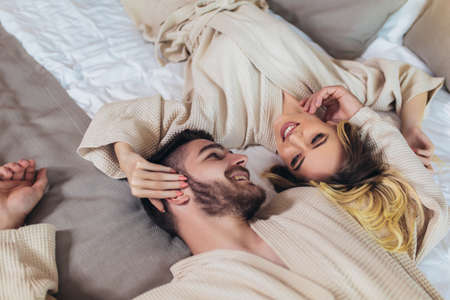Young couple in the hotel at morningの写真素材