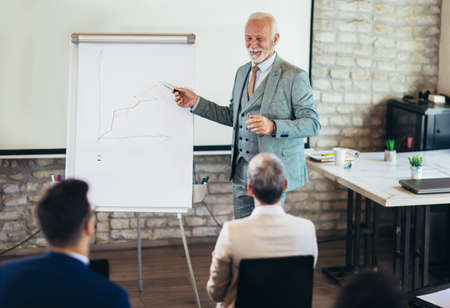Speaker at business workshop and presentation. Audience at the conference room.の写真素材