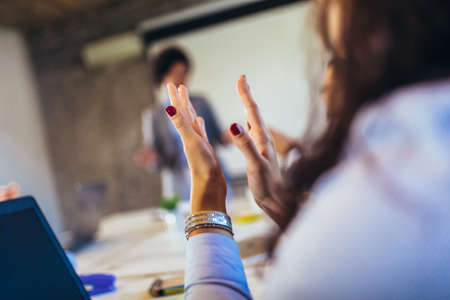 Close-up of business people clapping hands. Business seminar conceptの写真素材