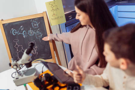 Children making a robot at home. Education in robotic at home.の写真素材