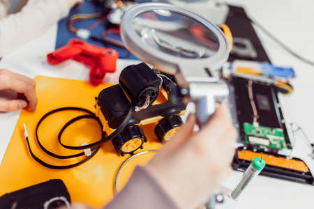 Close up of robotic car on table in engineering class at children development schoolの写真素材